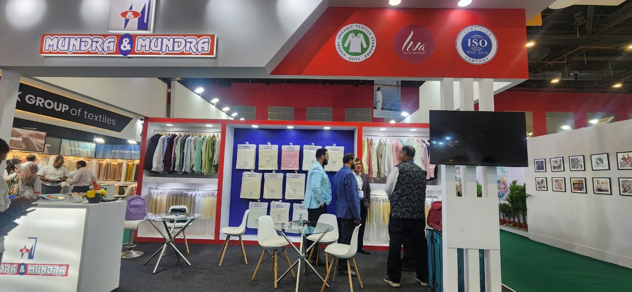 Mundra & Mundra exhibition booth showcasing fabric collections and certifications